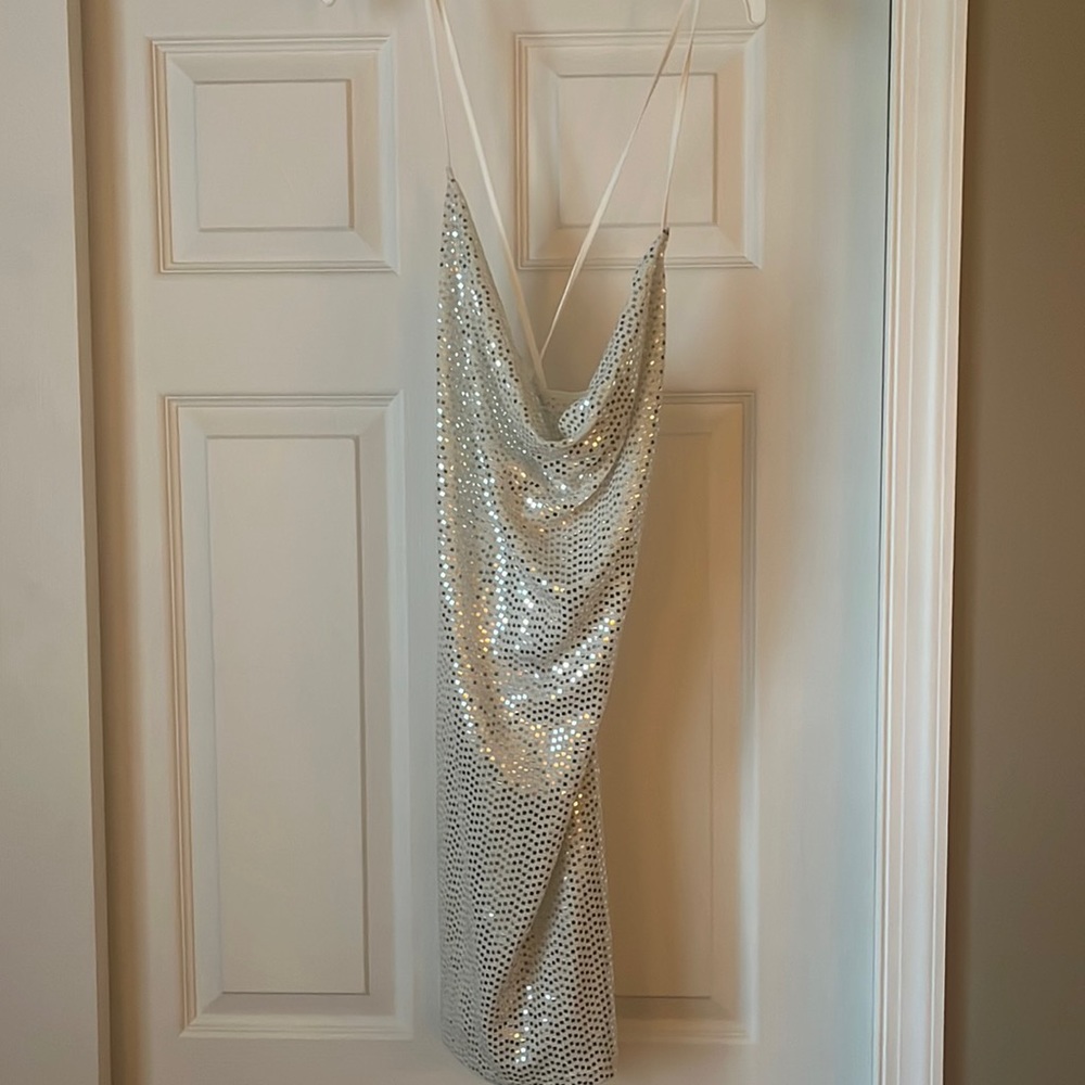 White and silver mini dress with cowl neckline and low back